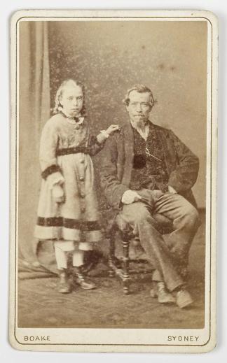 [Seated man and girl] Australian photographs